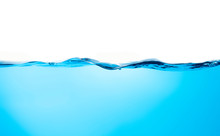 Blue Water Splashs Wave Surface With Bubbles Of Air On White Background.