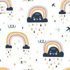 Wall Mural - Seamless cute pattern with hand drawn rainbows, rain drops and clouds. Creative scandinavian childish background for fabric, wrapping, textile, wallpaper, apparel. Vector illustration