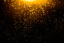 Golden Glitter Bokeh Lighting Texture Blurred Abstract Background For Birthday, Anniversary, Wedding, New Year Eve Or Christmas