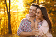 © New Africa - Happy couple in sunny park. Autumn walk