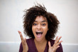 © mimagephotos - Close up front horizontal portrait of happy young african american woman