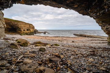 Canvas Print - Looking out to Sea from a Cave, in a cove known as The Wherry, among Magnesian Limestone Cliffs just south of Souter Lighthouse which is full of caves and sea stacks