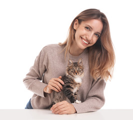 Wall Mural - Young woman with cat on white background. Owner and pet