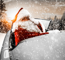 Wall Mural - Red old santa claus and winter car 