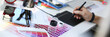 © H_Ko - Designer male arm hold graphic pad pen working on project