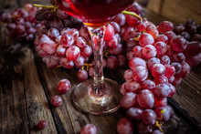 Fresh Organic Red Grape On Old Wooden Vintage Table