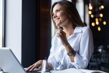 Young businesswoman on a coffee break