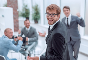 close up. smiling happy businessman looking at the camera