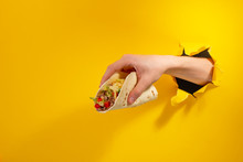 Hand Giving A Taco