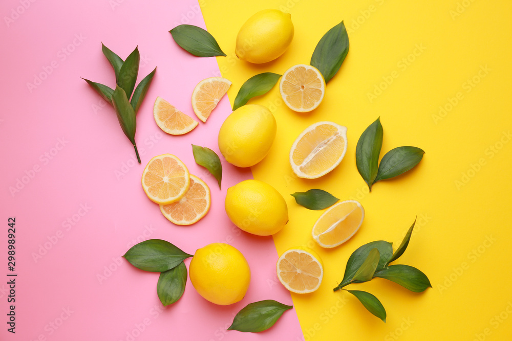 Ripe lemons on color background