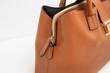 brown leather bag detail of zipper