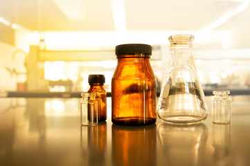 Wall Mural - science flask and brown bottle in vintage pharmacy laboratory background