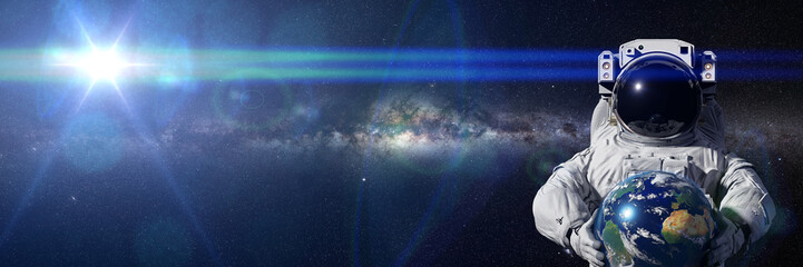 Wall Mural - astronaut holding planet earth