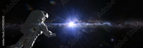 astronaut in outer space flying towards the center of the Milky Way galaxy