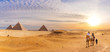 Famous Giza Pyramids in the desert, beautiful scenery with bedouins and camels, Cairo, Egypt