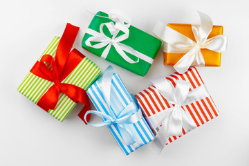 Wall Mural - Top view of pile of christmas gifts on white background