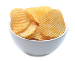 Potato chips on bowl isolated on white