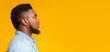 © Prostock-studio - Profile portrait of serious bearded black guy on yellow background