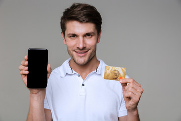 Man posing isolated using mobile phone.