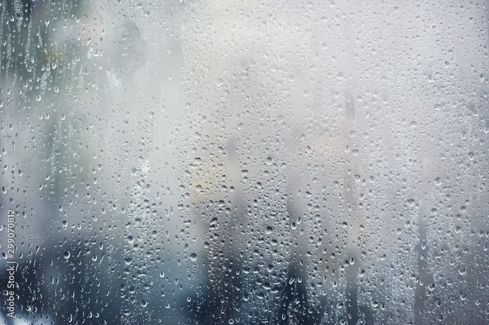 Rainy background, rain drops on the window, autumn season backdrop ...