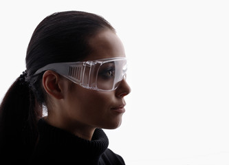 Wall Mural - portrait of beautiful woman in glasses of virtual reality with blue neon backlight. augmented realit