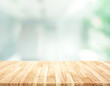 © hakinmhan - Empty wood table top on blur abstract modern room