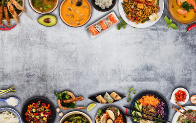 Top view composition of various Asian food in bowls