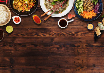 Wall Mural - Top view composition of various Asian food in bowls