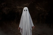 © JK2507 - Kid in costume of white ghost . Theme of Halloween and horror