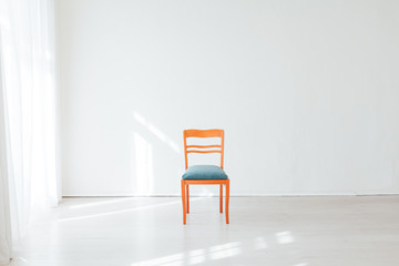 Wall Mural - one chair in the interior of an empty white room