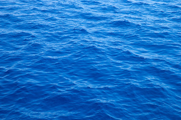 Sticker - Sea background . Blue water with sun reflections