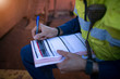 © Kings Access - Rope access miner supervisor written checking reviewing inspecting signing issuer the working in confined space permit prior work on construction site Perth, Australia
