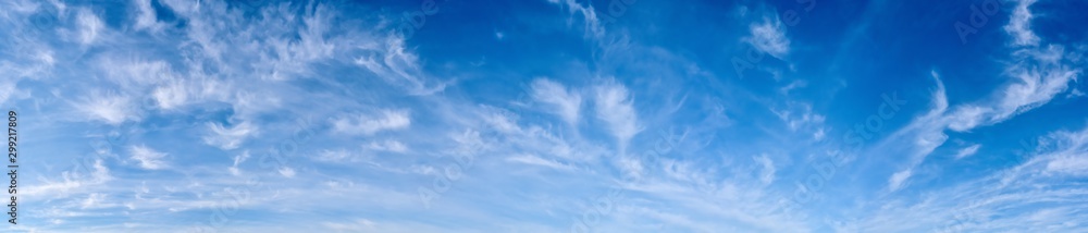 Panorama of a blue sky with white clouds as a backround - obrazy, fototapety, plakaty 