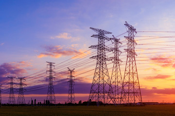 High voltage electricity tower sky sunset landscape,industrial background.