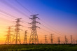 © ABCDstock - High voltage electricity tower sky sunset landscape,industrial background.