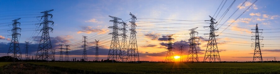 High voltage electricity tower sky sunset landscape,industrial background.