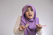© airdone - Indonesian Muslim Woman Confused wbout Her Rupiah Money