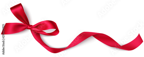 Fotografía Decorative red bow with long ribbon isolated on white background