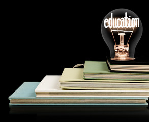 Poster - Light Bulb and Books with Education Concept