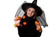 Czarownica trzymająca dynie. Halloween.