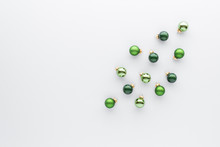 Christmas Composition. Green Baubles Top View Background With Copy Space For Your Text. Flat Lay.