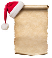 Old Paper Scroll And Red Christmas Hat Isolated On White
