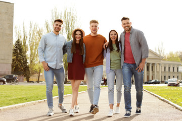 Poster - Happy people walking outdoors on sunny day