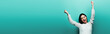 © LIGHTFIELD STUDIOS - angry happy brunette asian woman yelling on turquoise background, panoramic shot