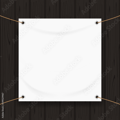 Fotografía vinyl banner blank white isolated on black wood frame, white mock up textile fab