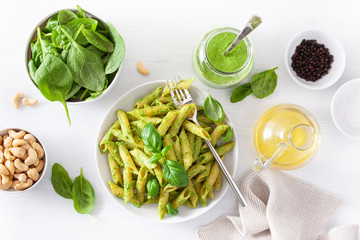 Wall Mural - penne pasta with spinach basil pesto sauce