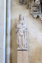 Vertical Shot Of A Female's Statue Inside Magdeburg's Cathedral