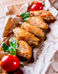 Wall Mural - Fried Chicken Wings on wooden table background