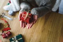 Woman Hands Showing Christmas Gift