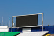 Large LED Screen at a Sports Stadium with blue sky background